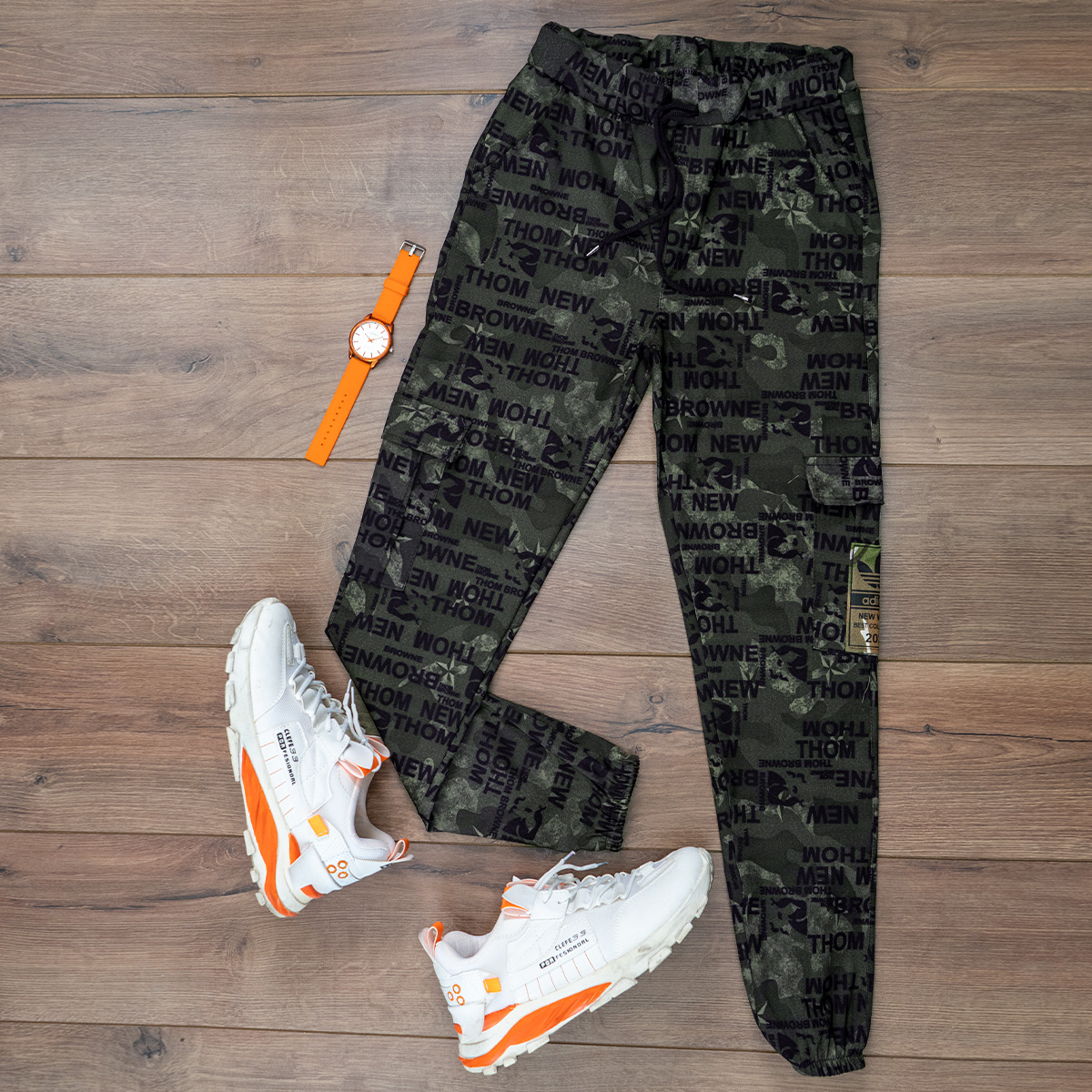 شلوار اسلش طرح نوشته سبز مردانه مدل Wiyan