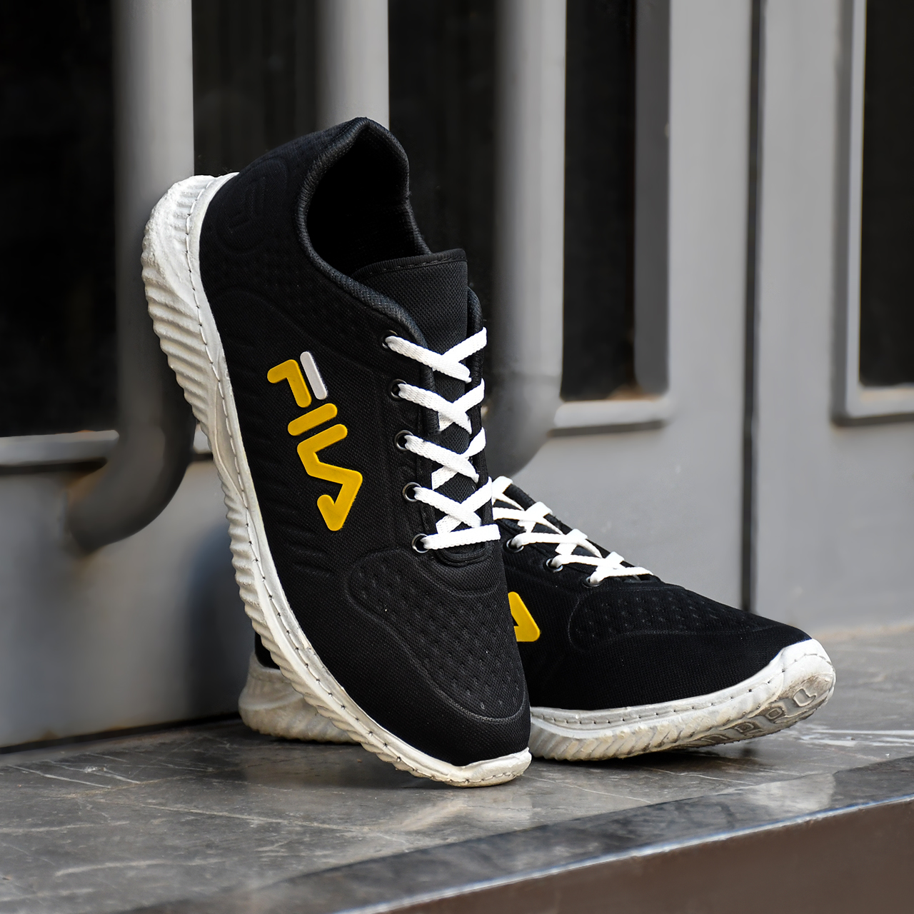 کفش ورزشی فیلا مشکی مردانه مدلFanio