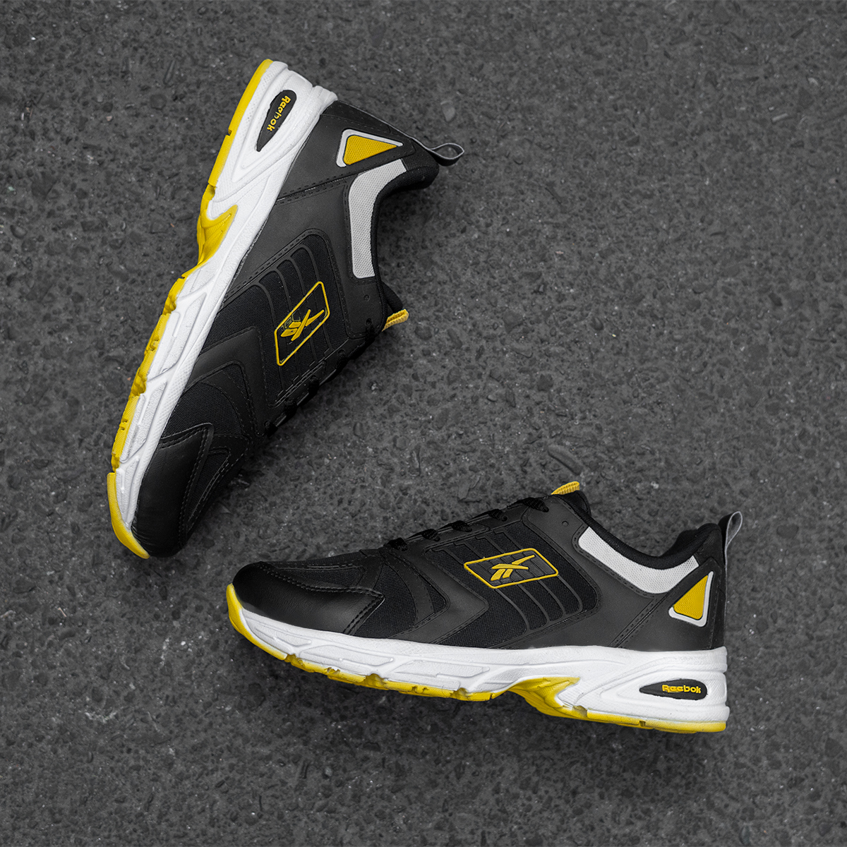 کفش ورزشی Reebok مردانه مشکی زرد مدل Loniel