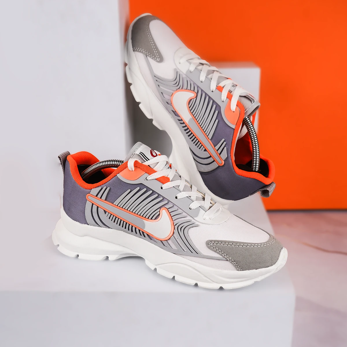 کفش ورزشی مردانه نایک طوسی نارنجی مدل مدل Farhan